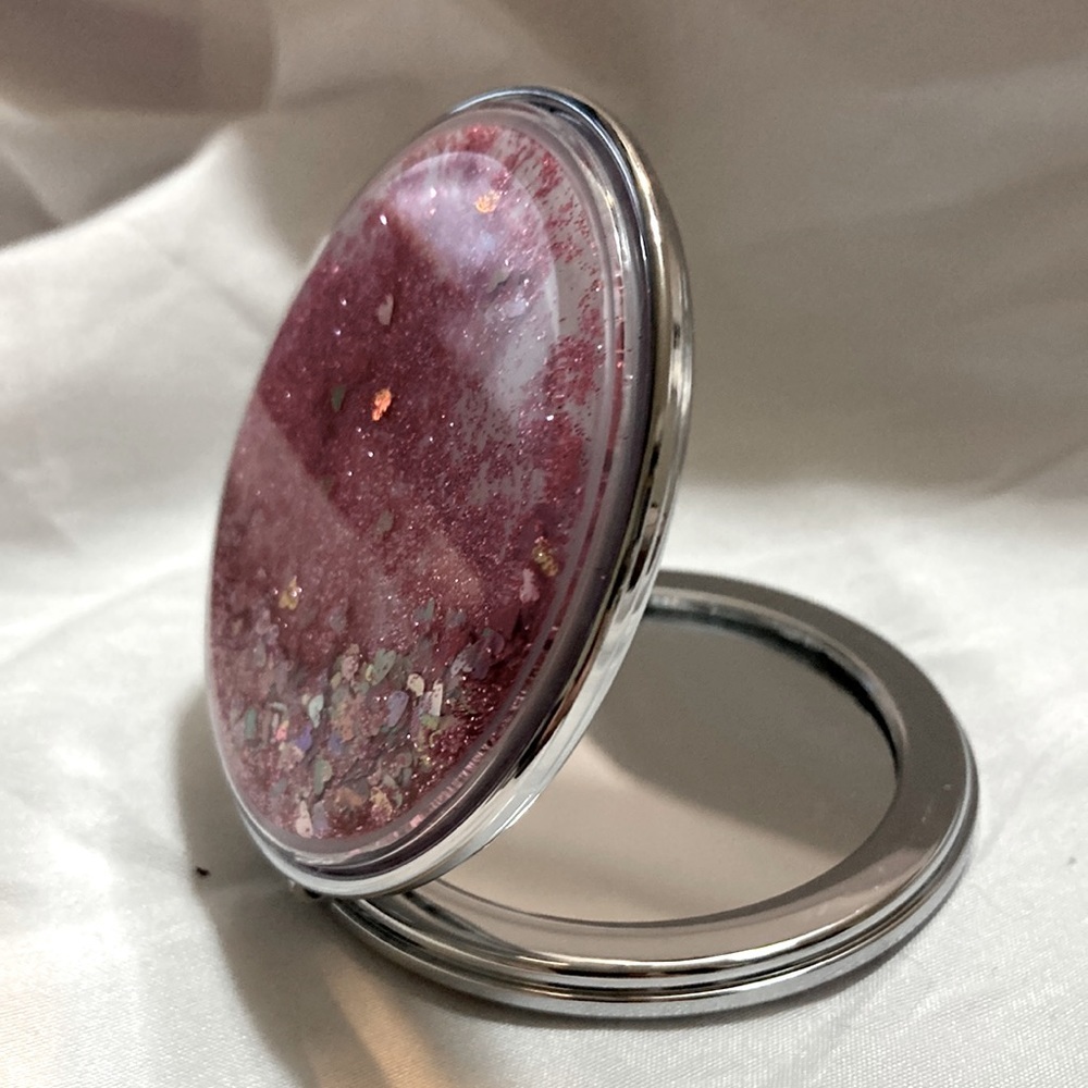 Pink and silver compact